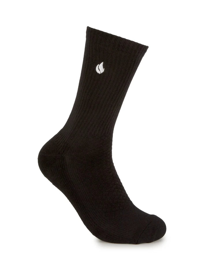 Side view of a black foot-ies Blaze sneaker sock with a ribbed cuff and white flame logo.