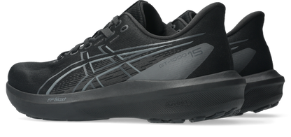 Black ASICS G-1000v5 running shoes with gray and white logo accents, shown from a side profile view on a white background.