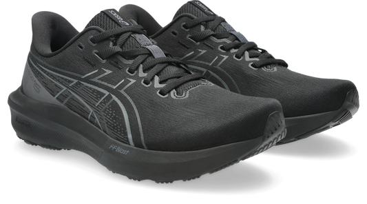 A pair of ASICS running shoes in black and dark gray, shown from a three-quarters angle against a clean white background.