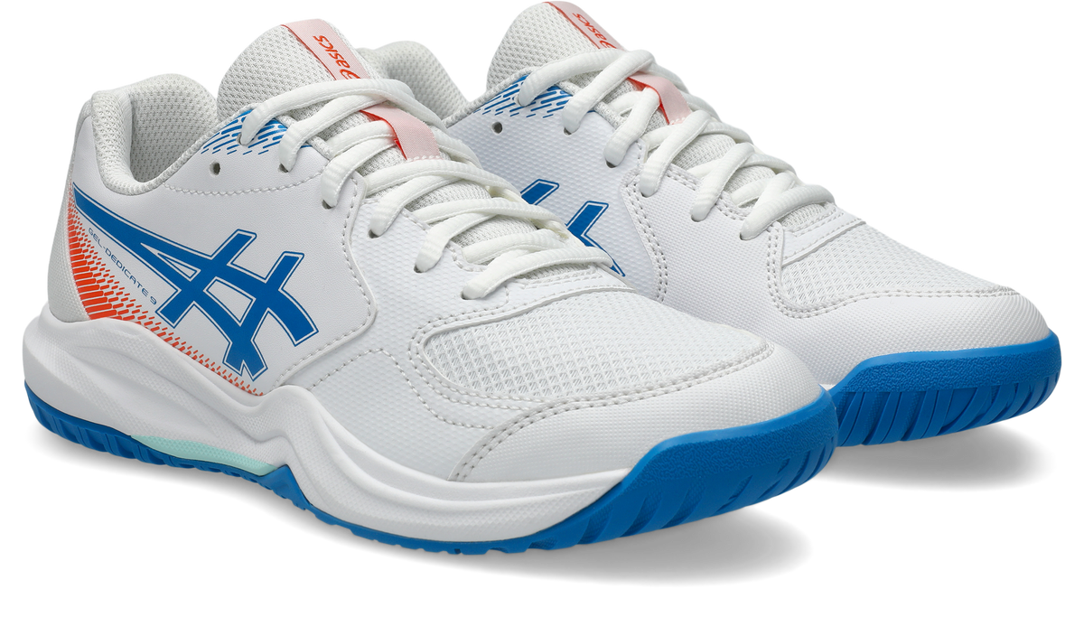 A pair of ASICS athletic court shoes in white, featuring a blue and orange side logo, white laces, and a blue outsole, shown against a clean white background.