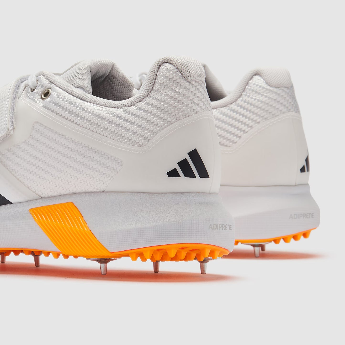 Adidas Adi-Power Incurza Cricket Shoes - White/Onyx/Tangerine