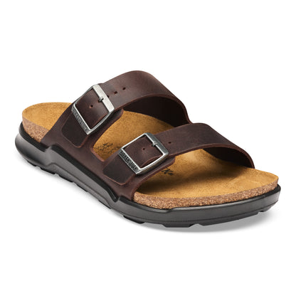 Brown sandal with cork sole on a white background