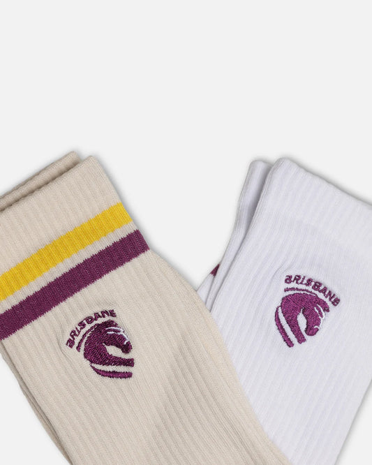 Two ribbed crew socks shown on a light gray background. One sock is cream with yellow and dark purple stripes and a dark purple Brisbane horse logo, and the other is white with a matching dark purple Brisbane horse logo.