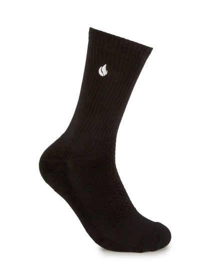 Side view of a black foot-ies Blaze sneaker sock with a ribbed cuff and white flame logo.