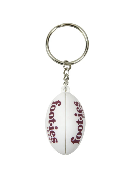A white foot-ies socks rugby ball keychain with silver hardware.