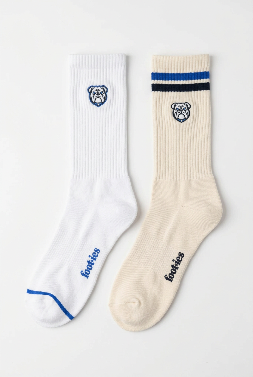 White and cream foot-ies Bulldogs crew socks with blue trim and team logo.