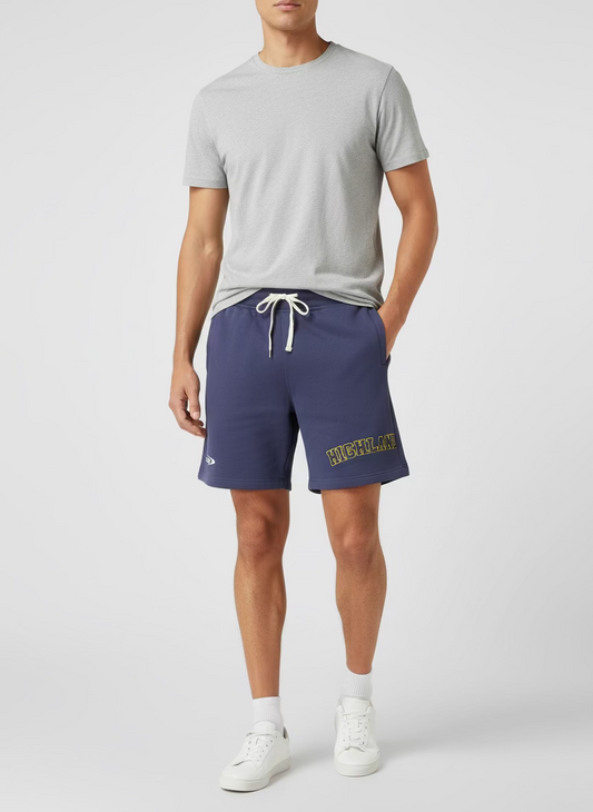 Purple shorts with yellow text on a textured surface