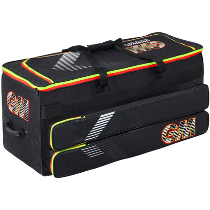 Black Gunn & Moore Original Easi-Load Wheelie Cricket Bag viewed from the back and side, showing zippered compartments, red and yellow neon trim, white striped graphics, and bold red GM logos on the side and top pocket.