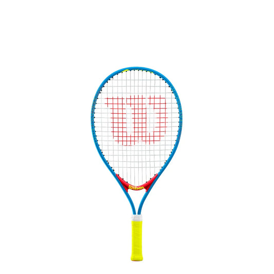 A Wilson junior tennis racket with a blue frame, red Wilson logo on the strings, and a bright yellow grip, shown against a solid white background.