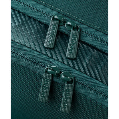 Close-up of Wilson-branded zipper pulls and textured trim on the green Blade V10 racket bag.