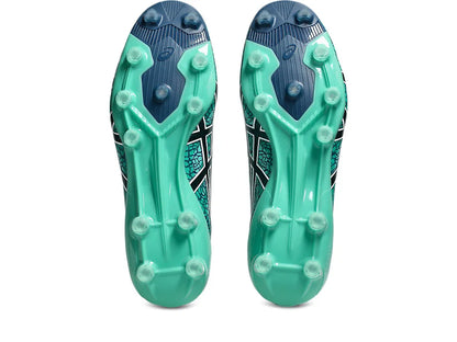 Bottom view showing the outsoles of a pair of ASICS Menace 5 boots, highlighting the Aurora Green and Twilight Blue sole design with clear molded studs and midfoot support ribs.