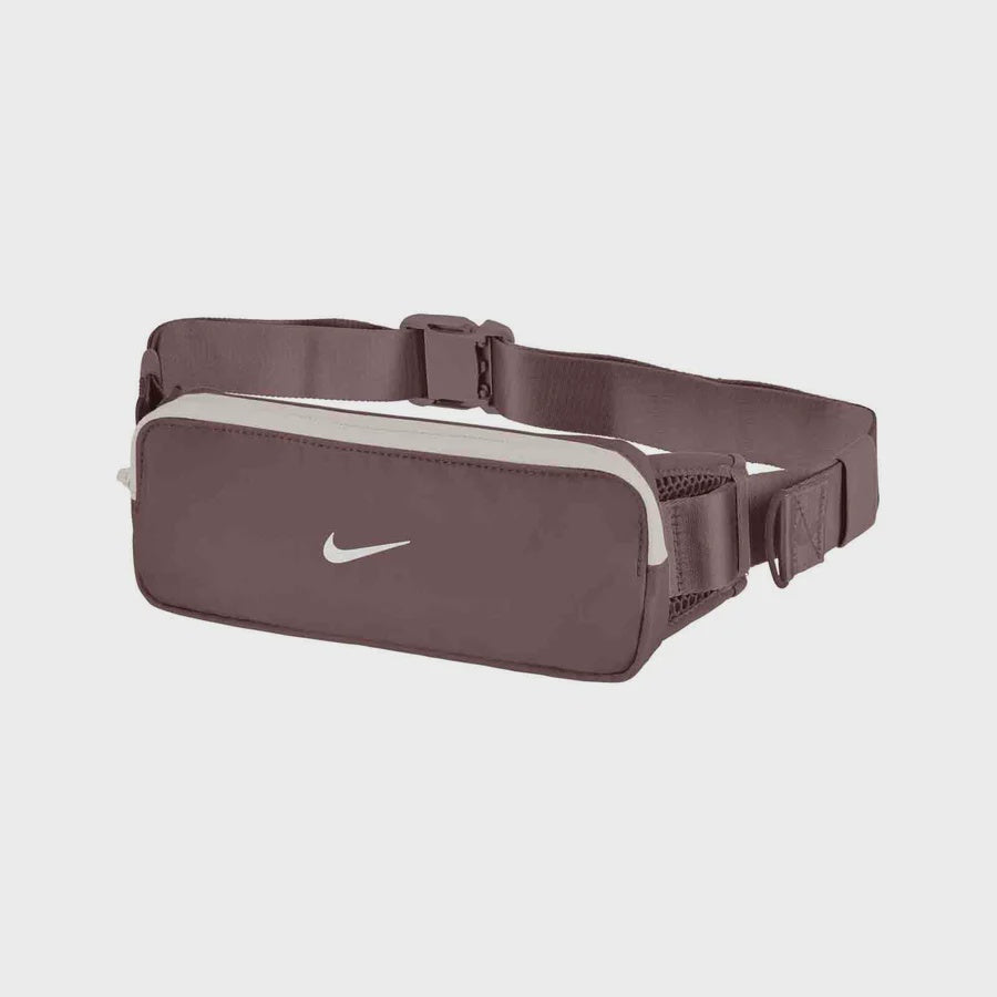 Brown Nike waist bag on a white background