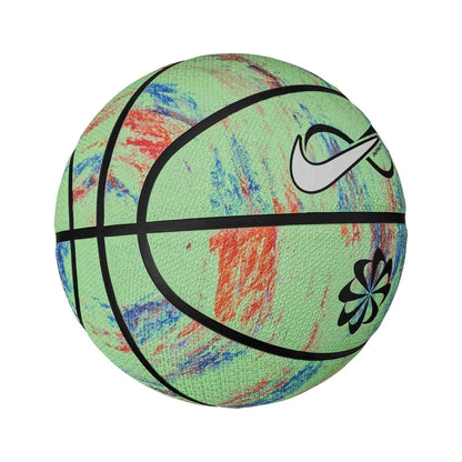 A Nike basketball with a light green base and multicolored paint-splatter pattern in red, blue, and orange, featuring black seams, a white Nike swoosh, and a black flower logo.