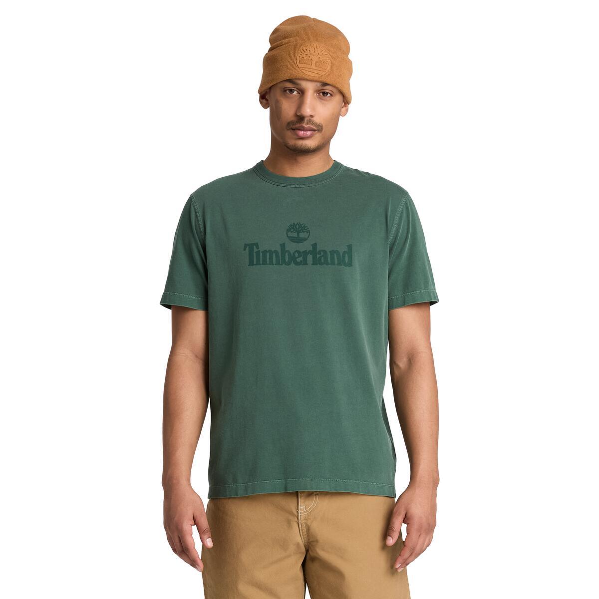 Green tee with Timberland logo on person