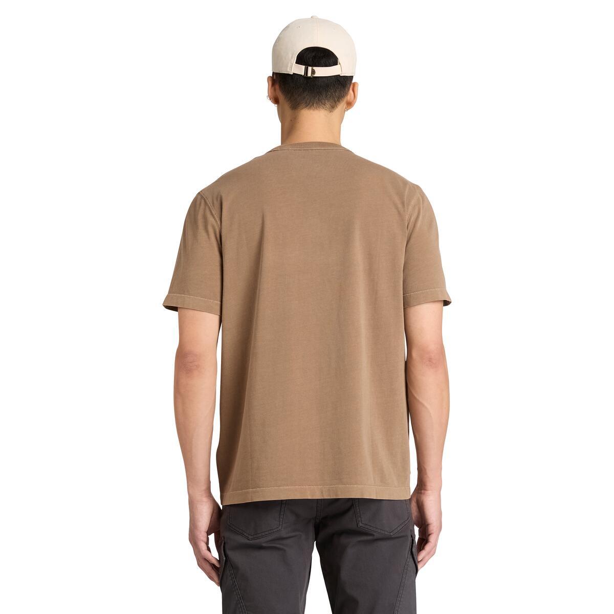 A back view of a brown short-sleeve crewneck t-shirt with a dark brown Timberland logo printed on the chest.