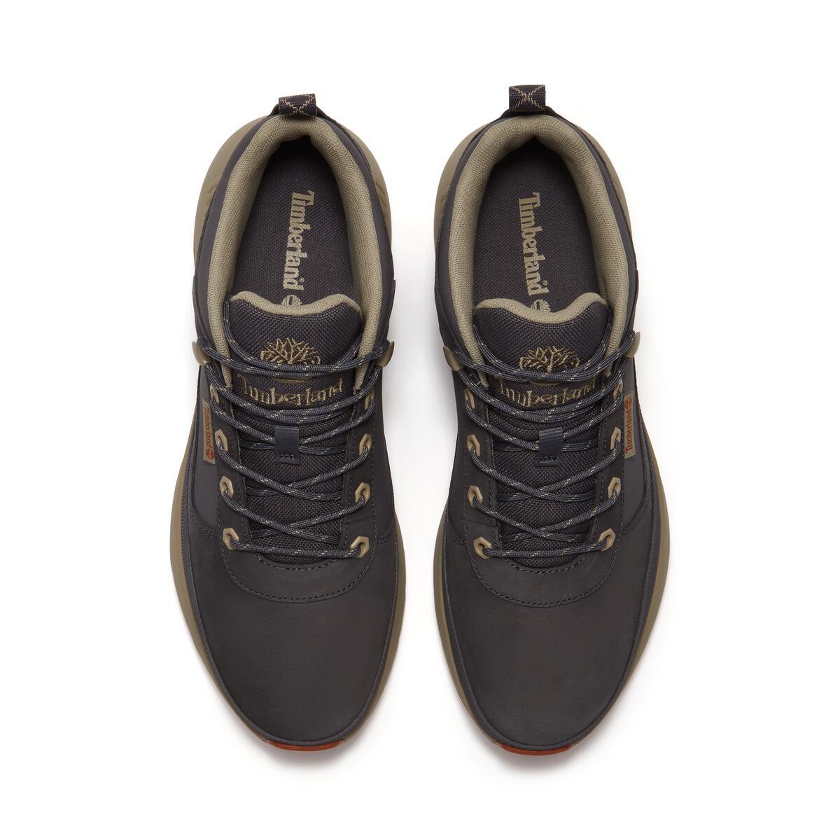A pair of Timberland mid-height lace-up boots shown from a top-down view on a light gray background.